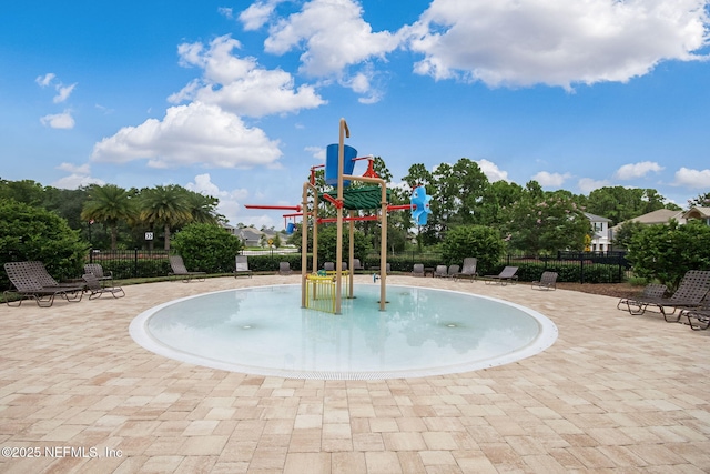 view of play area with a patio