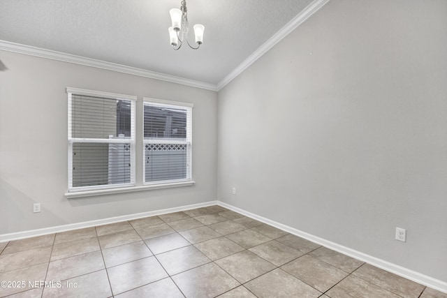 tiled empty room featuring a textured ceiling, crown molding, and a chandelier