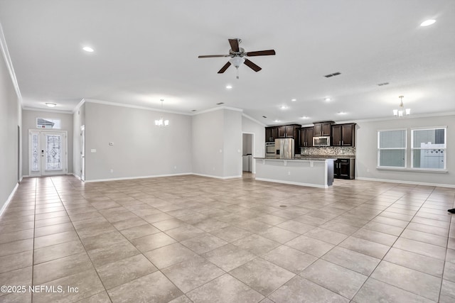 unfurnished living room with ceiling fan with notable chandelier, light tile patterned floors, and crown molding