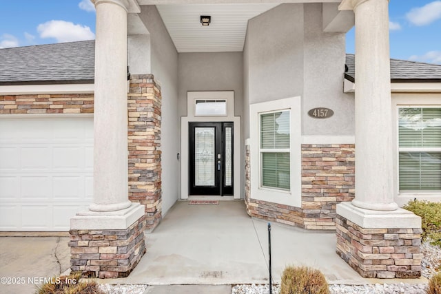 property entrance featuring a garage