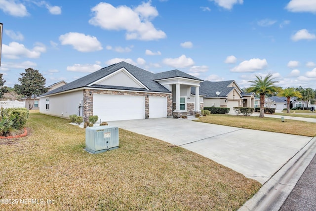 view of front of home with a garage and a front yard