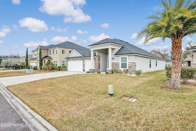 view of front facade featuring a front yard and a garage