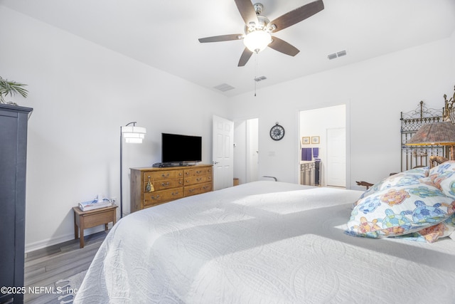 bedroom featuring ceiling fan and hardwood / wood-style flooring