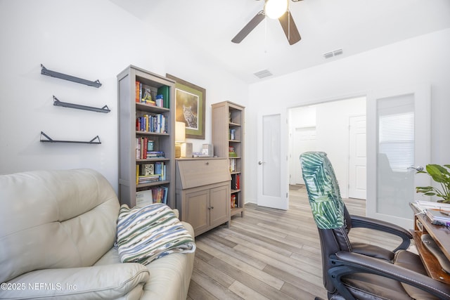 office area featuring light hardwood / wood-style floors and ceiling fan