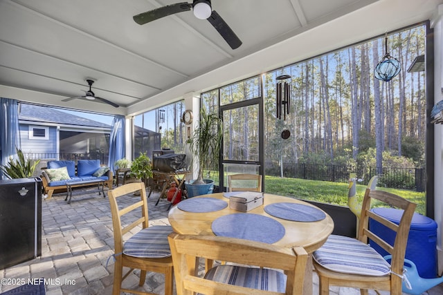 sunroom / solarium with ceiling fan