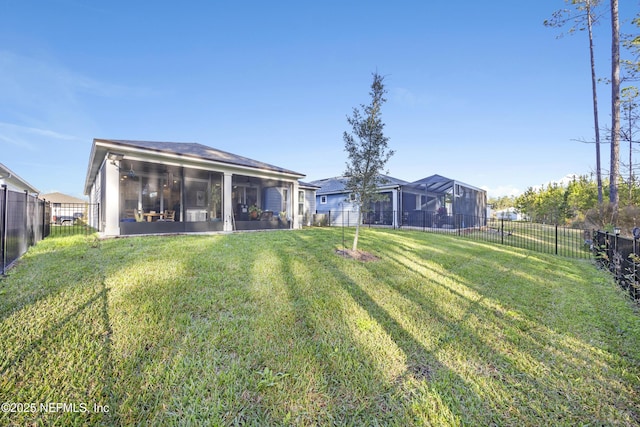 view of yard with a sunroom