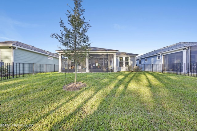 view of yard featuring a sunroom