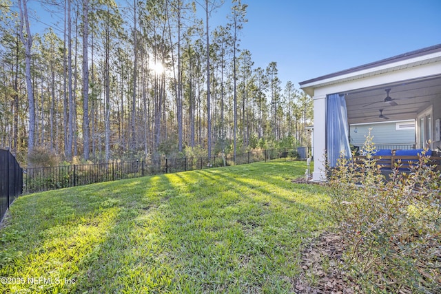 view of yard featuring ceiling fan