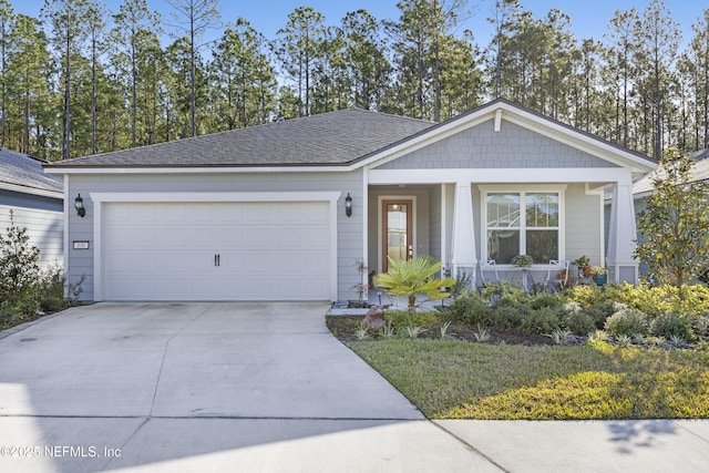 single story home featuring a garage