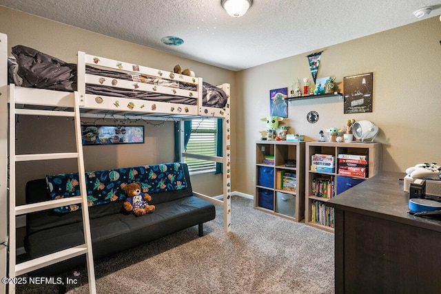 bedroom featuring carpet floors and a textured ceiling