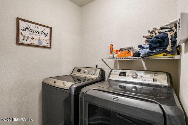 washroom featuring separate washer and dryer