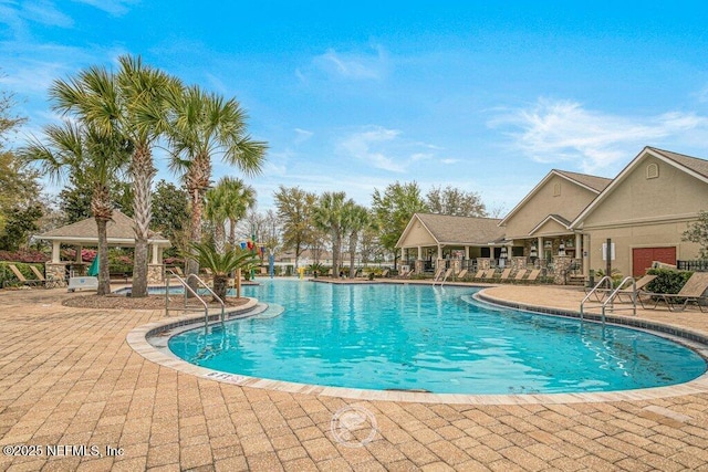 view of pool with a gazebo and a patio