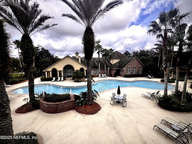 view of pool featuring a patio