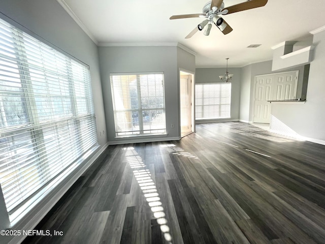 unfurnished living room with dark hardwood / wood-style flooring, ceiling fan with notable chandelier, and ornamental molding