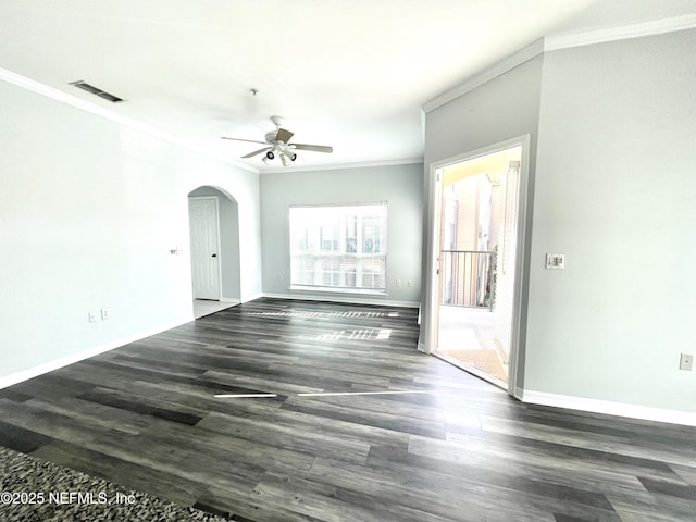 spare room featuring ornamental molding, ceiling fan, and dark hardwood / wood-style flooring