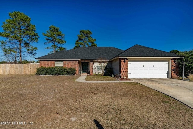 ranch-style house with a front yard and a garage