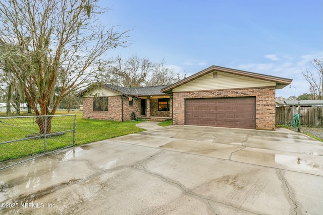 ranch-style home with a front lawn and a garage