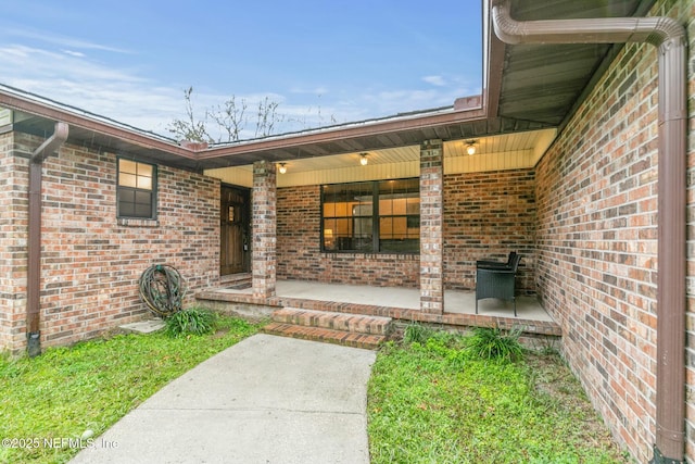 doorway to property with a porch