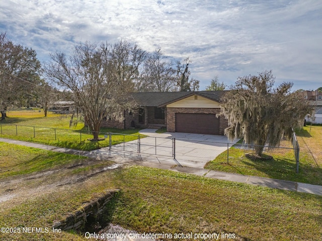 view of front of house featuring a front yard and a garage