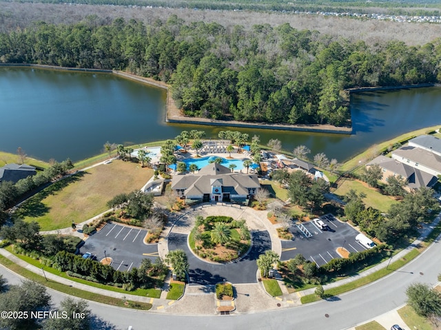 birds eye view of property with a water view