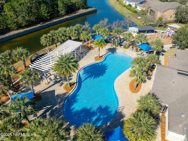 view of swimming pool featuring a patio area