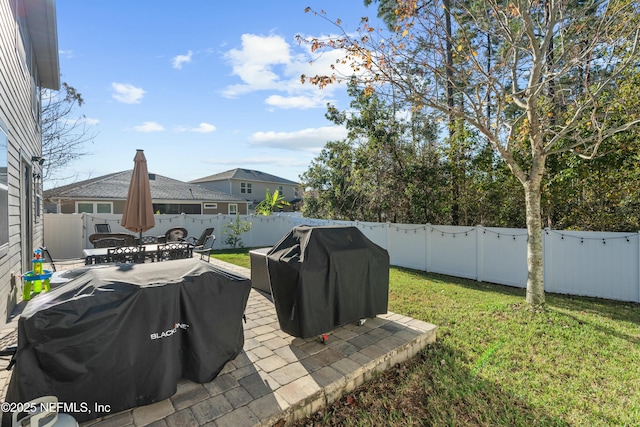 view of yard with a patio area