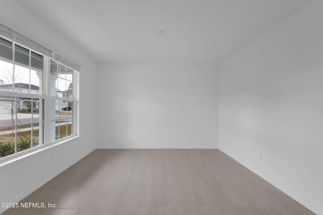 unfurnished room with a wealth of natural light