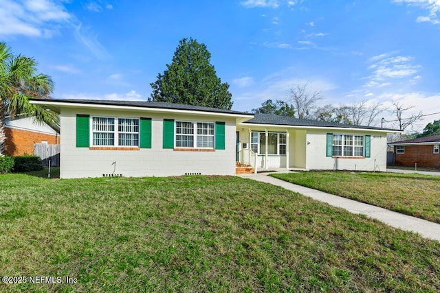 ranch-style house with a front yard