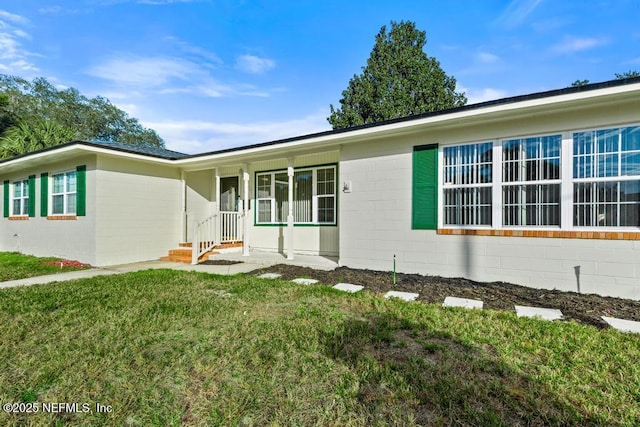 ranch-style house with a front yard