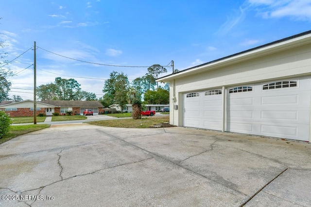 garage with a yard