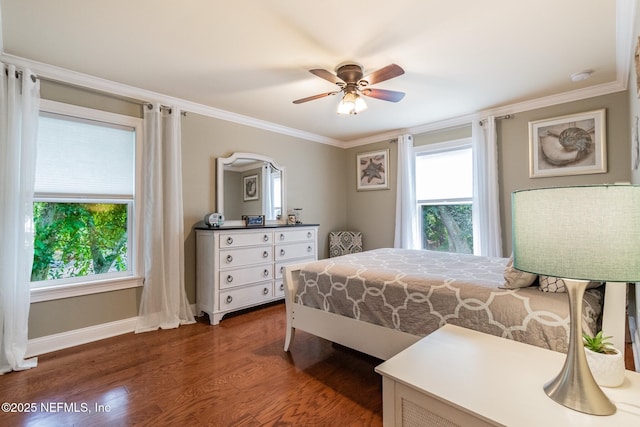 bedroom with multiple windows, ornamental molding, dark hardwood / wood-style floors, and ceiling fan