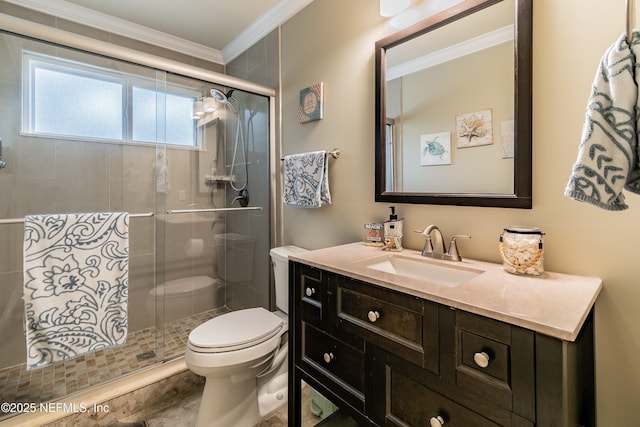 bathroom with vanity, crown molding, toilet, and walk in shower