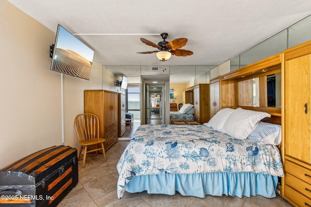 bedroom featuring ceiling fan