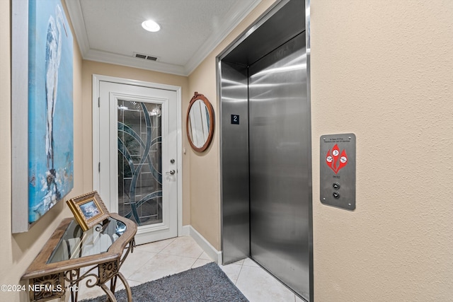 interior space featuring light tile patterned floors, elevator, and crown molding