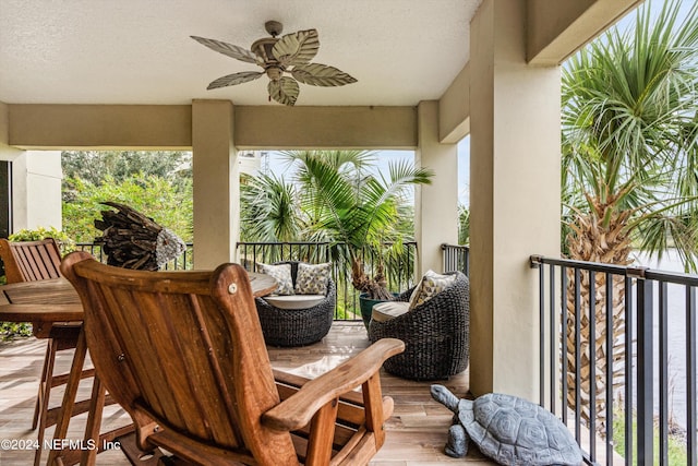 balcony featuring ceiling fan