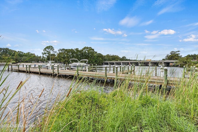 view of dock with a water view