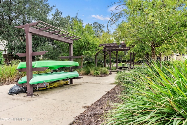 surrounding community featuring a pergola