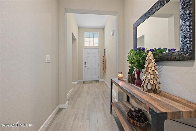 doorway featuring light wood-type flooring