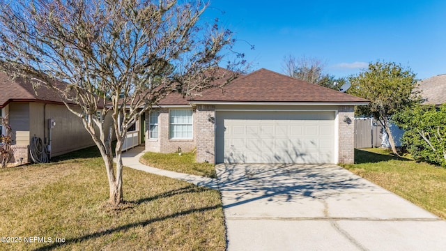 single story home with a garage and a front yard