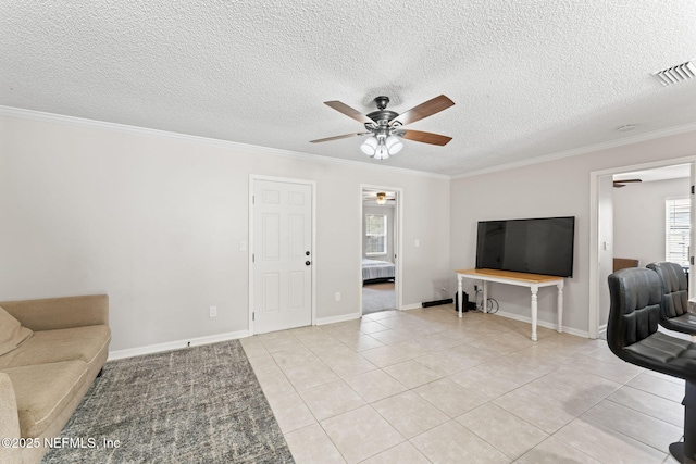 tiled living room with crown molding, a textured ceiling, and ceiling fan