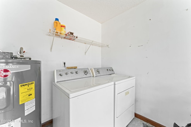 laundry room with independent washer and dryer, water heater, and a textured ceiling