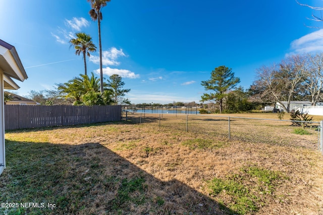 view of yard with a water view