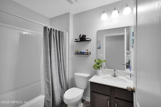 full bathroom featuring vanity, toilet, and shower / bath combo with shower curtain