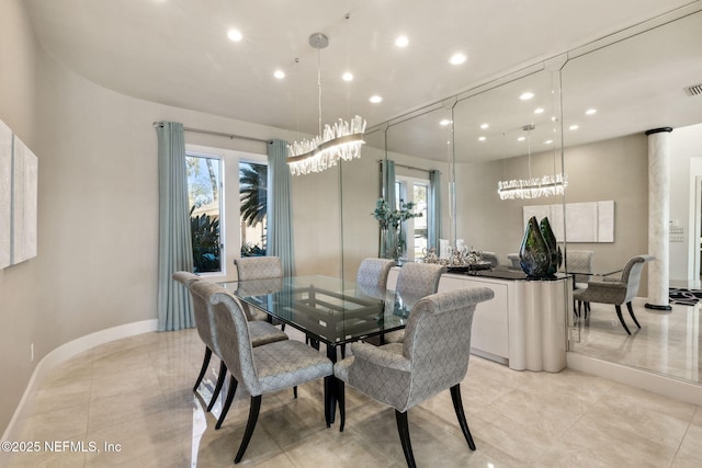 dining area with decorative columns