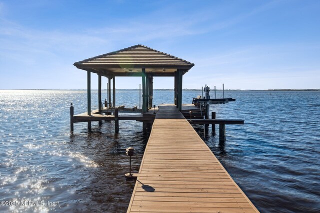 view of dock with a water view