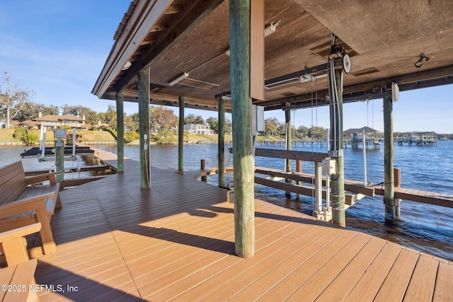 dock area with a water view