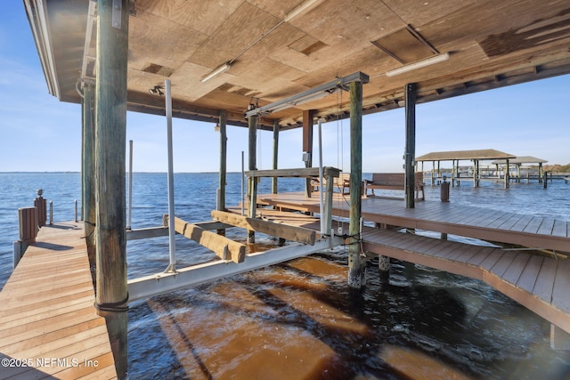 view of dock with a water view