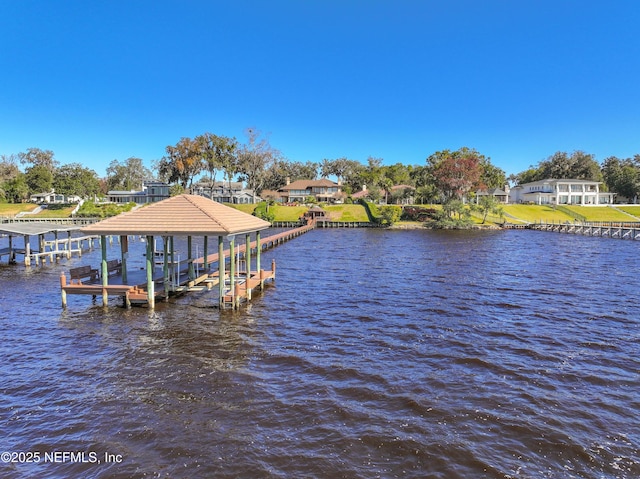 view of dock with a water view