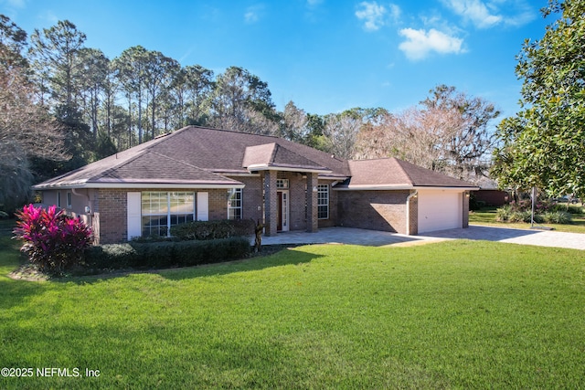 ranch-style home with a garage and a front yard