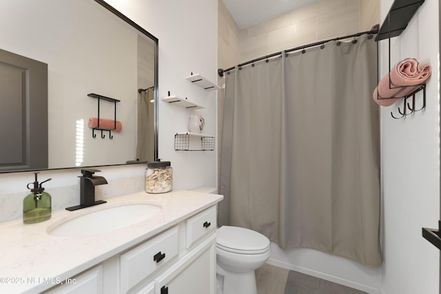 full bathroom with toilet, shower / bath combo, and vanity